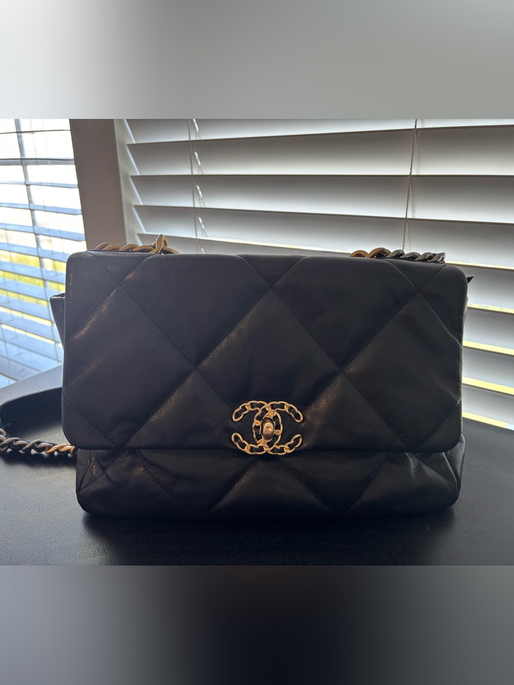 CHANEL Black Quilted Shoulder Bag with Gold Chain CC Emblem